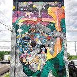 a graffiti covered wall